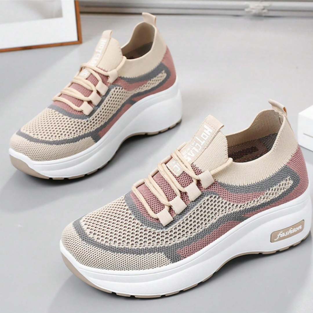Zapatillas deportivas cómodas para mujer con plataforma ergonómica y tejido elástico transpirable.