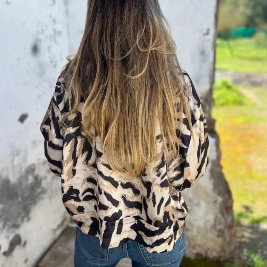 Sara - Chaqueta bomber estampado cebra con cremallera
