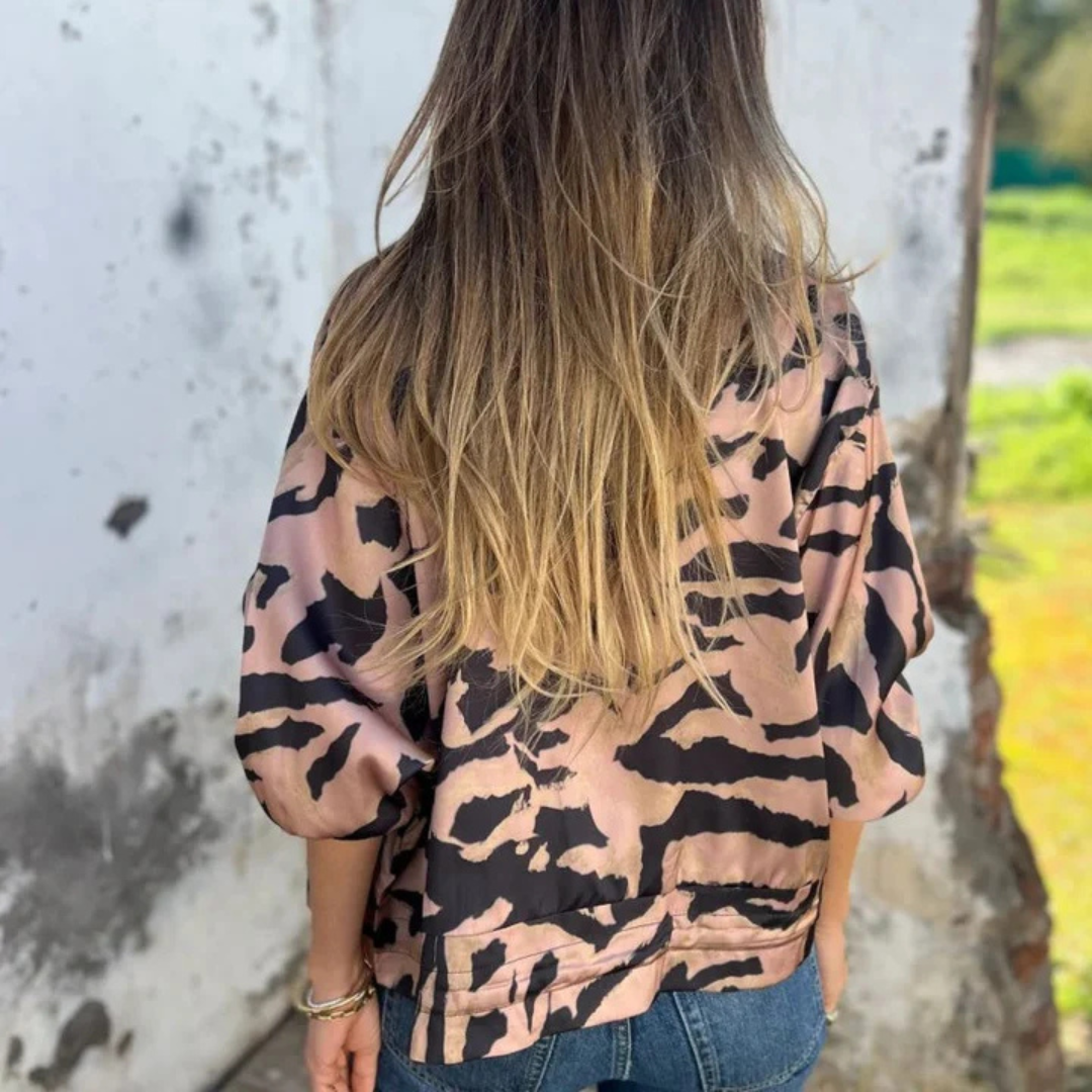 Sara - Chaqueta bomber estampado cebra con cremallera