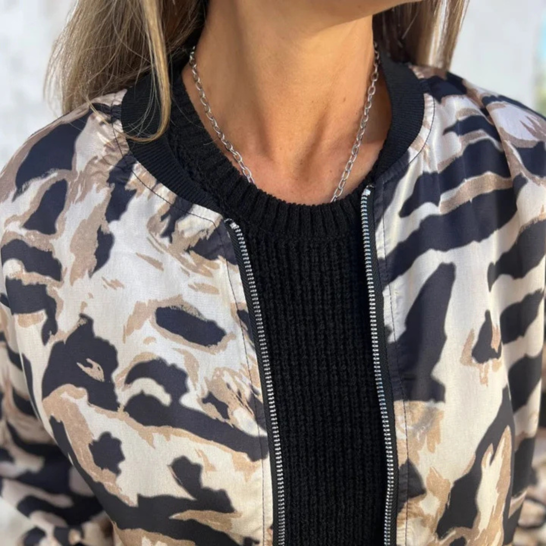 Sara - Chaqueta bomber estampado cebra con cremallera
