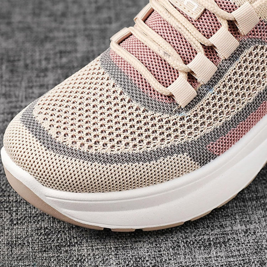 Zapatillas deportivas cómodas para mujer con plataforma ergonómica y tejido elástico transpirable.