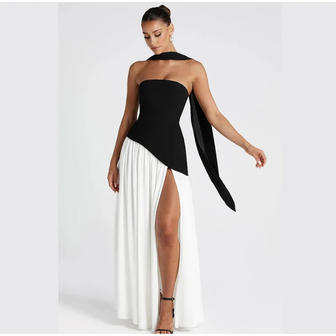 Vestido largo con corsé sin tirantes, abertura lateral y pañuelo a juego.